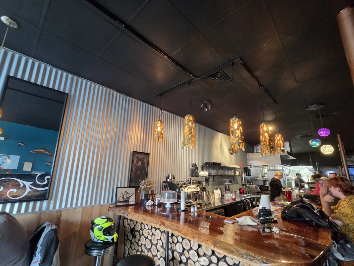Goondocks Bistro interior with a live-edge counter and pendant lights